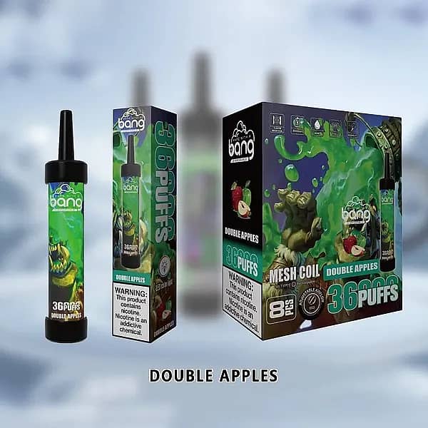 w=600,h=600,fit=scale down,gravity=auto,sharpen=1,metadata=none,format=auto,quality=70 Bang 36000 Puffs Disposable Vape – Double Apples flavor, featuring a green-themed package design with apple graphics and a fantasy-style character illustration.